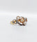 Bague 51 Bague tourbillon or jaune, diamants et perle 58 Facettes A05451