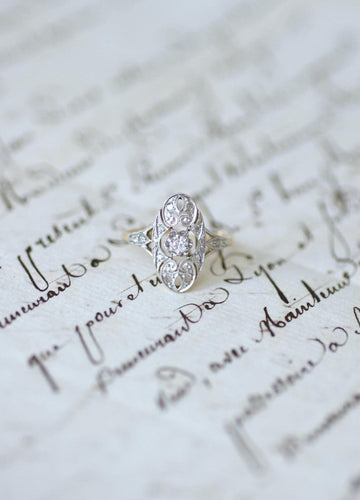 Bague 50 Bague Art Deco Arabesques Ovale Diamants 58 Facettes