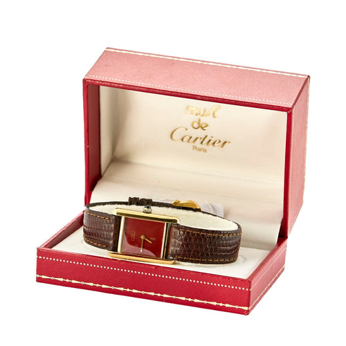 Montre CARTIER - Montre Modèle Tank Must en argent plaqué or cadran laqué rouge, écrin et garantie internationale Cartier. 58 Facettes