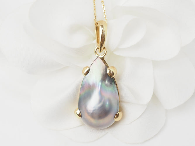 Pendentif Pendentif Mabé de Tahiti en or jaune 58 Facettes 33335