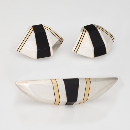 CARTIER - Schmuckset Vintage-Ohrringe Brosche 70er Jahre aus Gelbgold, silber und Onyx 