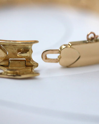 Bracelet Bracelet Maille Articulée Cœur signé "Piaget" en Or Jaune 58 Facettes A11266