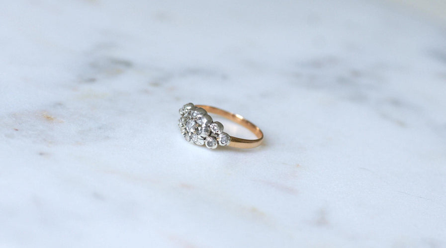 Bague Ancienne bague jarretière Marguerite diamants 58 Facettes