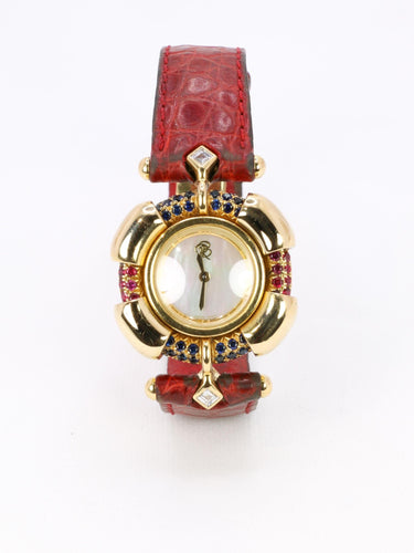 Montre RENE BOIVIN Montre Chrysalide or jaune rubis saphirs diamants 58 Facettes 1089.1