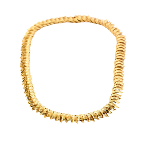 Collier Collier rigide à décor de feuillage en or jaune 58 Facettes CHA0615