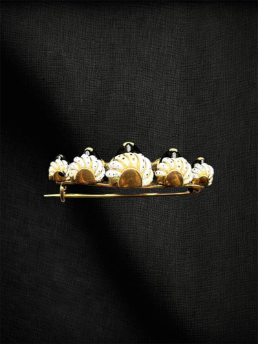 Broche La « Broche des Maures » en or jaune 58 Facettes