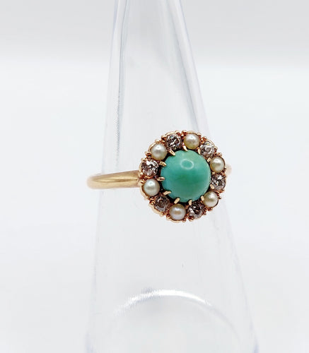 Bague 52.5 Bague marguerite or jaune, cabochon de turquoise, diamants et perles (circa 1900) 58 Facettes A05219