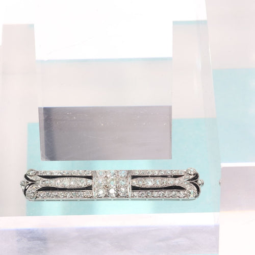 Broche Allure Art Déco : Broche en platine avec diamants et onyx contrastés 58 Facettes 19163-0166