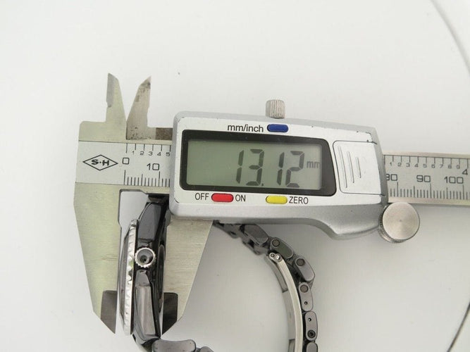 Montre montre CHANEL j12 intense black ceramique noire 58 Facettes 259358