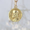 Pendentif Médaille de baptême or jaune Christ Catacombes signée Becker 58 Facettes CVP191