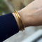 Bracelet Bracelet jonc ouvrant grand modèle en or jaune 18k 58 Facettes