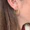 Boucles d'oreilles Paire de créoles torsadées 58 Facettes