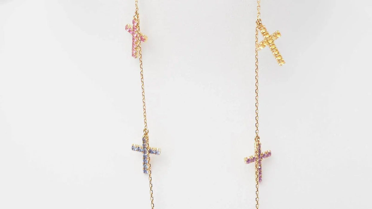 Collier CARTIER - Collier 11 Croix en or rose diamants et saphirs de couleurs 58 Facettes 32788