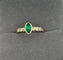 Bague Bague en or avec émeraude taille marquise et diamants 58 Facettes 50006