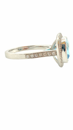 Bague 53 Bague en or blanc topaze bleue et diamants 58 Facettes