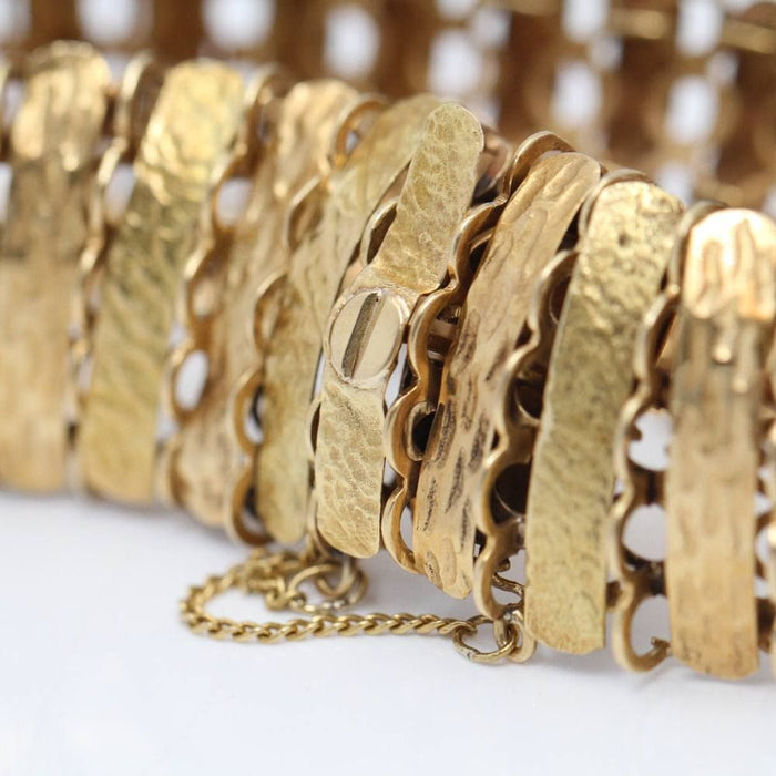 Bracciale snodato in oro 18k