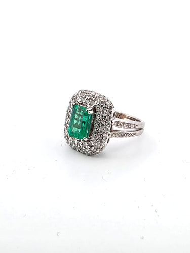 Bague 60 Bague en or blanc massif 18 carats sertie d'une émeraude colombienne et de diamants. 58 Facettes