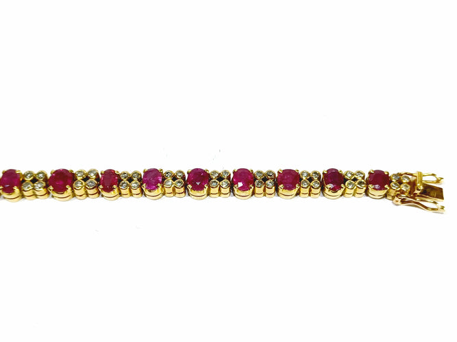 Pulsera de oro amarillo con diamantes rubí
