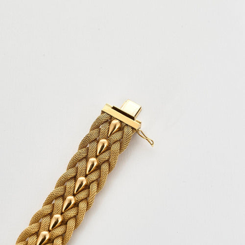 Bracelet Bracelet tréssé en or jaune 58 Facettes GAP1476