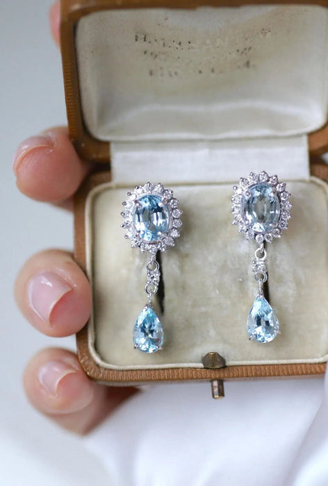 White gold, blue topaz, diamond drop earrings