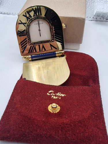 Montre Cartier - Pendulette de table en laiton plaqué et émail 58 Facettes