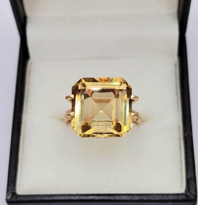 Gold cocktail ring adorned with a citrine