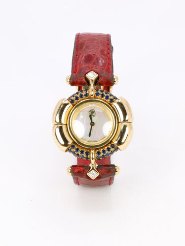 Montre RENE BOIVIN Montre Chrysalide or jaune rubis saphirs diamants 58 Facettes 1089.1