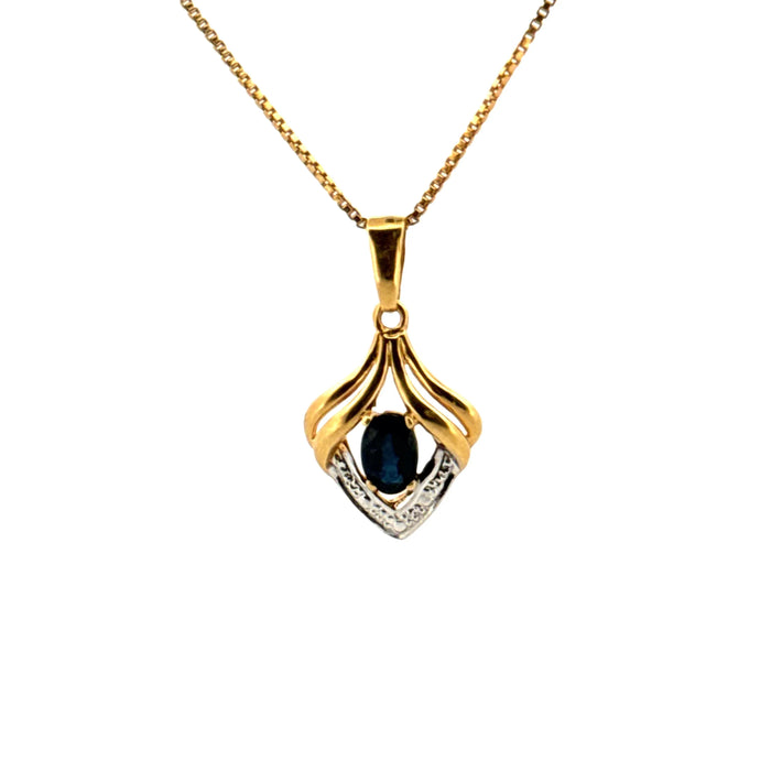 Yellow gold and topaz pendant