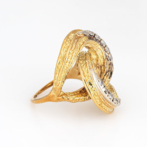 Bague 50 Bague vintage en or jaune et diamants avec nœud infini des années 70 58 Facettes G13169
