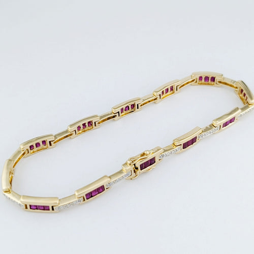 Bracelet Bracelet en or jaune, rubis et diamants 58 Facettes 33380
