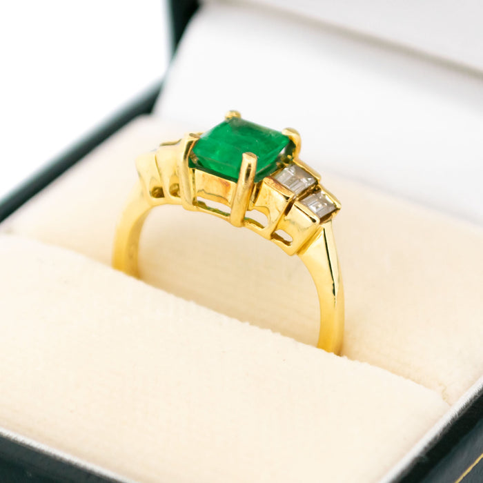 Yellow gold emerald diamond ring