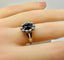 Bague 54 Bague marguerite en or blanc, saphir et diamants 58 Facettes AB576