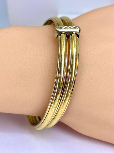 Bracelet Bracelet double joncs, or blanc, diamants, Yves Saint Laurent 58 Facettes AB601