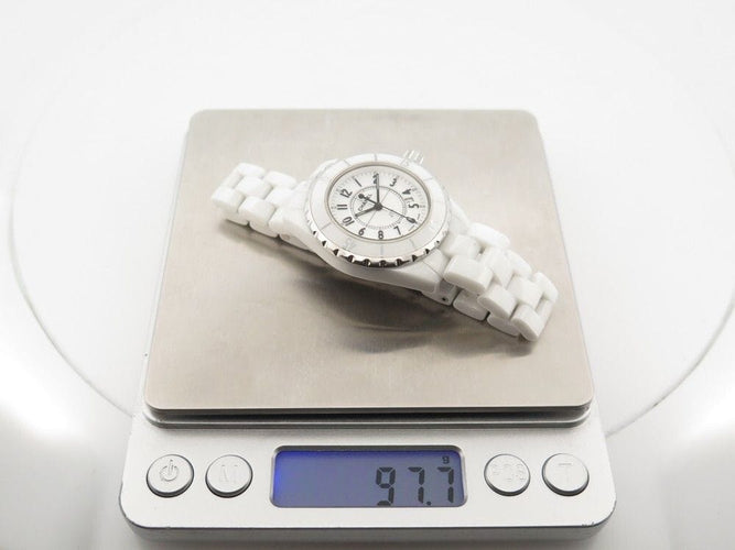 Montre montre CHANEL j12 33 mm en ceramique blanche quartz 58 Facettes 259477
