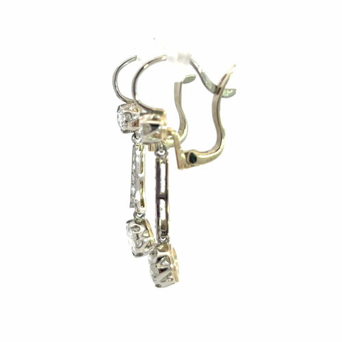 Boucles d'oreilles Boucles d'oreilles pendantes en or et platine de style édouardien serties de diamants 58 Facettes