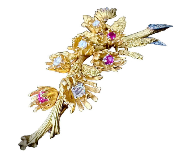 Broche Broche braches de noisetier sertie de brillants et rubis en or jaune 58 Facettes