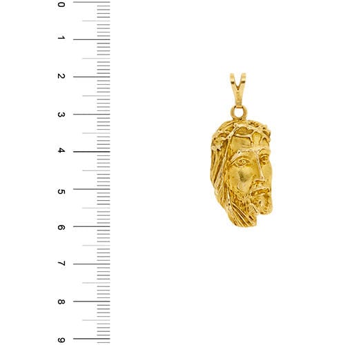 Pendentif Pendentif en or jaune avec visage du Christ 58 Facettes 36598