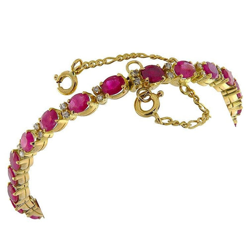 Bracelet Bracelet en or jaune avec diamants et rubis 58 Facettes G3886