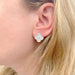 Boucles d'oreilles Boucles d'oreilles Van Cleef & Arpels "Vintage Alhambra" or blanc, diamants. 58 Facettes 33739