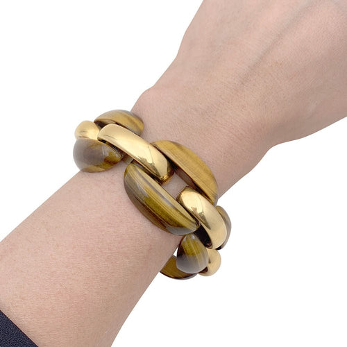 Bracelet Bracelet vintage, or jaune et oeil de tigre. 58 Facettes 33986