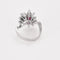 Bague 53.5 Bague mouvementé or blanc, rubis et diamants 58 Facettes BA661