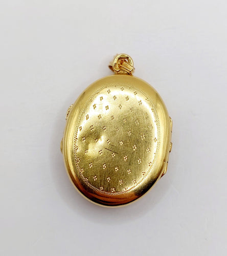 Pendentif Pendentif porte-photo or jaune miniature demoiselle (circa 1920) 58 Facettes A05939