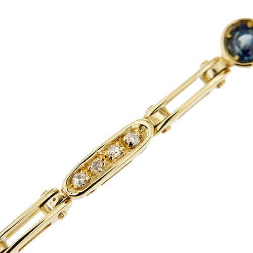 Geelgouden armband met segmenten, saffieren en diamanten 
