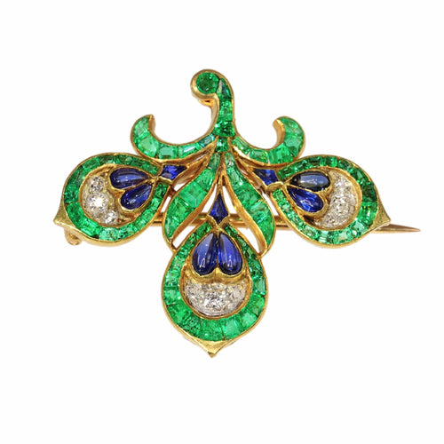 Broche Fleur de lys : broche ancienne française à l'essence verte intense 58 Facettes 23167-0365