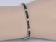 Bracelet Bracelet de tennis en or blanc serti de diamants noirs et blancs 58 Facettes 2119