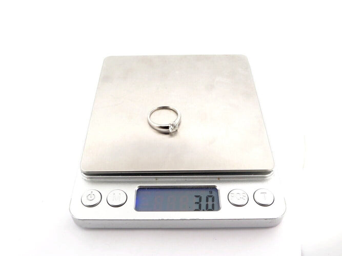 Bague 50 bague solitaire 0.63ct gia t50 or blanc 18k + alliance sertie diamant 0.1ct 58 Facettes 270398