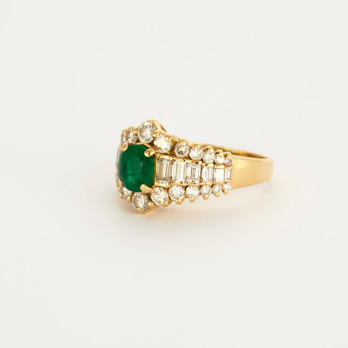 Smaragd diamanten kousenband ring