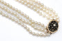 Collier Collier de perles à trois rangs avec fermoir en or et rosaces de diamants, vers 1900 58 Facettes 11576