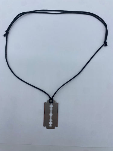 Pendentif Dinh Van - Pendentif "Lame de rasoir" GM sur cordon 58 Facettes 096424105792