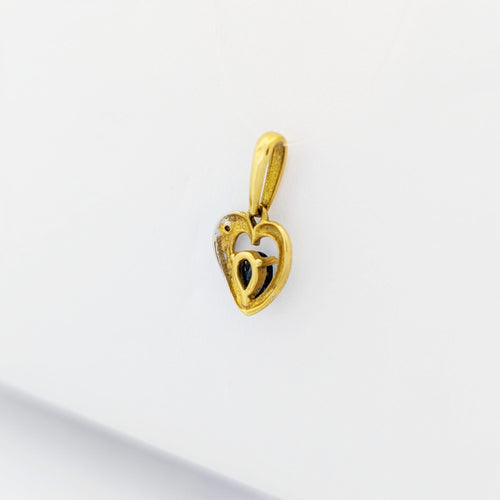 Pendentif Pendentif Coeur en or jaune et saphir 58 Facettes 32934